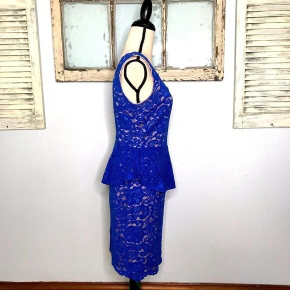 Beautiful Lace Peplum Dress by Explosion - Picture 4 of 13